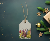 Nature-inspired gift tag showcasing a wildflower meadow in intricate watercolour detail.