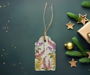 Gift tag with a delicate wildflower watercolour design on acid-free paper, paired with biodegradable jute rope.