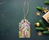 Gift tag with a delicate wildflower watercolour design on acid-free paper, paired with biodegradable jute rope.