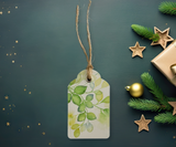 Handmade gift tag featuring a vibrant seasonal green foliage watercolour illustration, printed on high-quality acid-free paper.