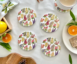 Close-up of Beauties of the Wild ceramic coaster showing detailed wildlife illustration and glossy ceramic finish