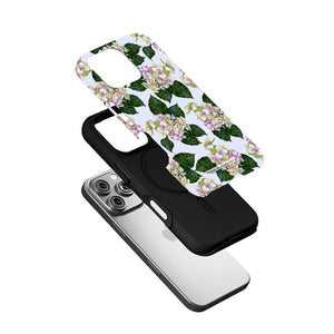 iPhone case disassembled to show dual-layer protection with inner soft slipcover and outer polycarbonate shell.