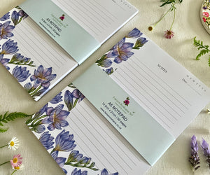 Two Freesias in Bloom notepads with bellybands close-up