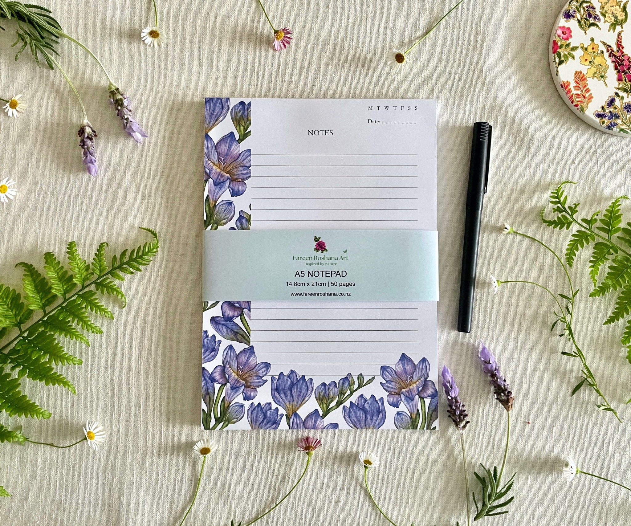 Front view of Freesias in Bloom notepad with floral bellyband