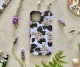Front view of the Hues of Serenity iPhone case featuring original watercolour hydrangeas in blue and purple tones.