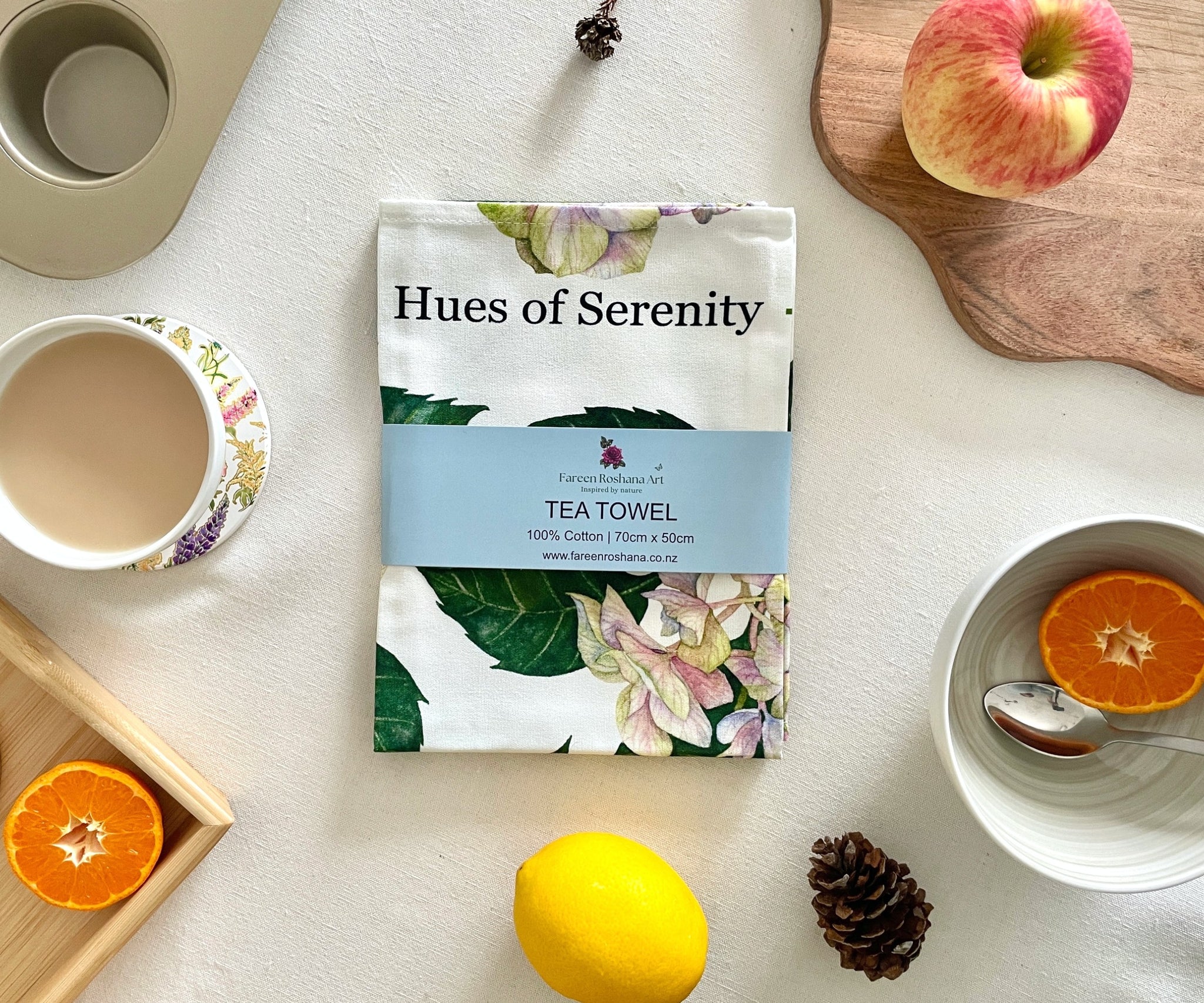 Hydrangea tea towel folded with belly band packaging, ready for gifting.