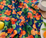 Close-up of Nasturtium Dreams tea towel with watercolour nasturtium print.