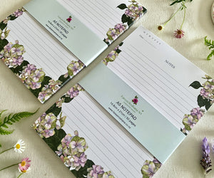 Two Hues of Serenity notepads close-up with bellybands