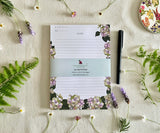 Front view of Hues of Serenity notepad with bellyband